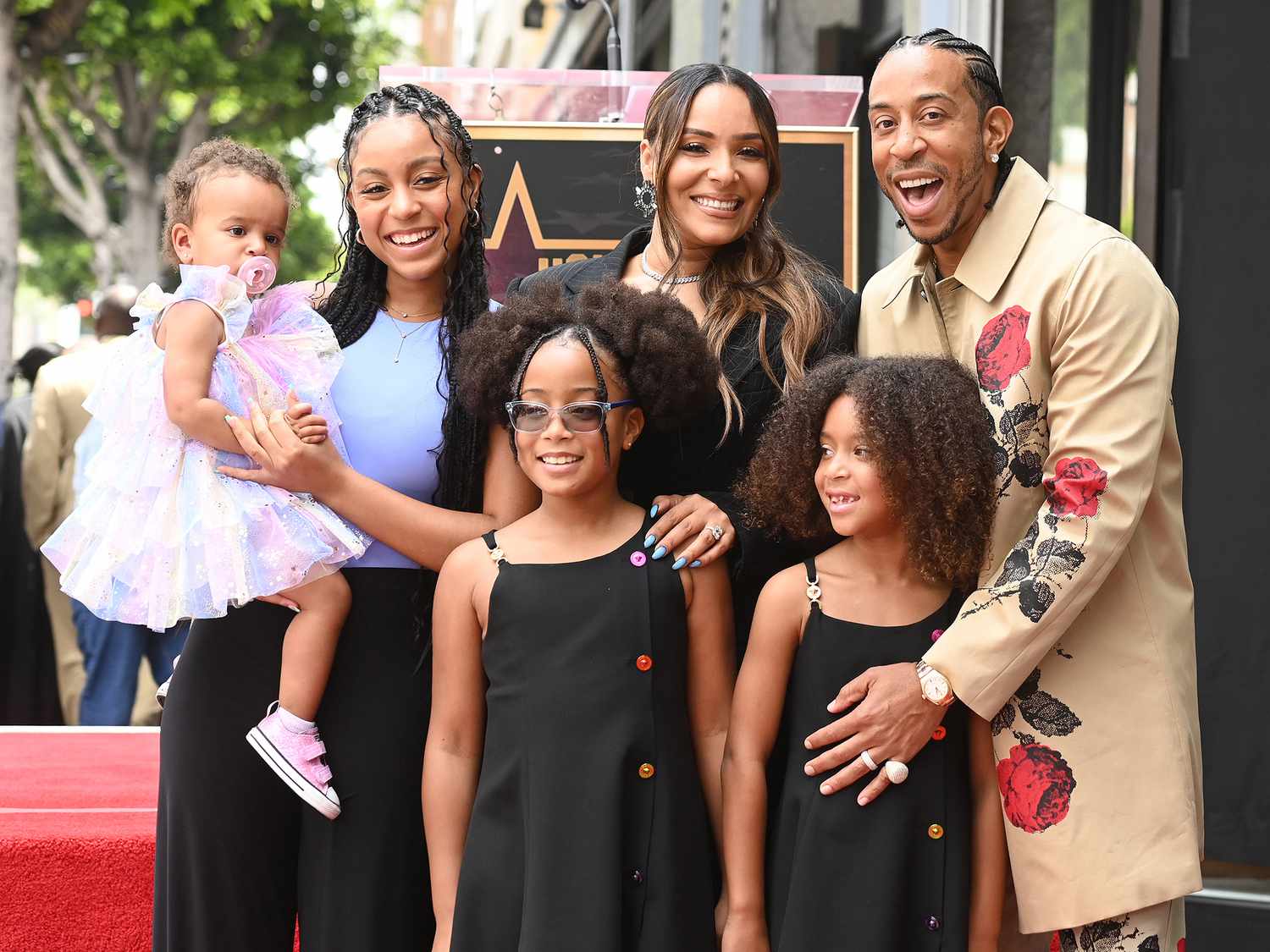Eudoxie Mbouguiengue, Ludacris and family at the star ceremony where Ludacris is honored with a star on the Hollywood Walk of Fame on May 18, 2023