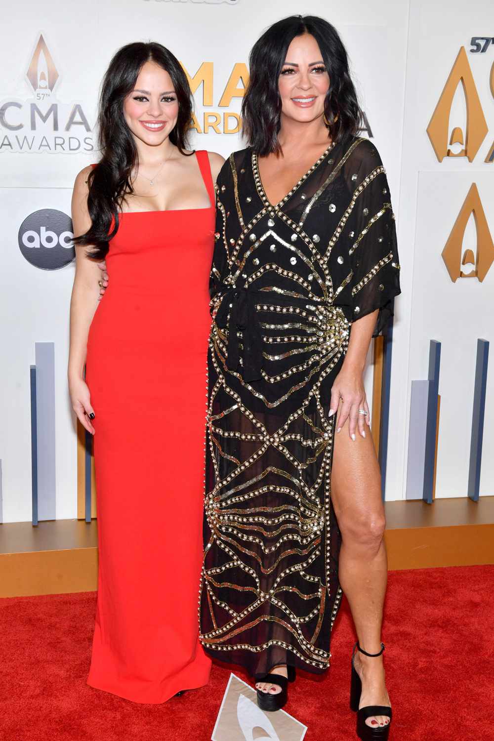 Olivia Evans and Sara Evans attend the 57th Annual CMA Awards at Bridgestone Arena on November 08, 2023 in Nashville, Tennessee. 