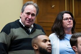 Mandatory Credit: Photo by MICHAEL REYNOLDS/EPA-EFE/Shutterstock (13842100g) Dean (L) and Michelle Nasca (R), parents of late Chase Nasca, a 16-year-old youth that died after apparently committing suicide, stand and are recogized during testimony from TikTok CEO Shou Zi Chew at the House Energy and Commerce Committee hearing 'TikTok - How Congress Can Safeguard American Data Privacy and Protect Children from Online Harms', on Capitol Hill in Washington, DC, USA, 23 March 2023. TikTok faces fierce criticism from US lawmakers, some of whom want the social media platform banned as a perceived threat to national security. House Energy and Commerce Committee hearing TikTok, Washington, USA - 22 Mar 2023