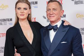 Daniel Craig, right, and Ella Craig pose for photographers upon arrival for the premiere of the film 'Glass Onion: A Knives Out Mystery'