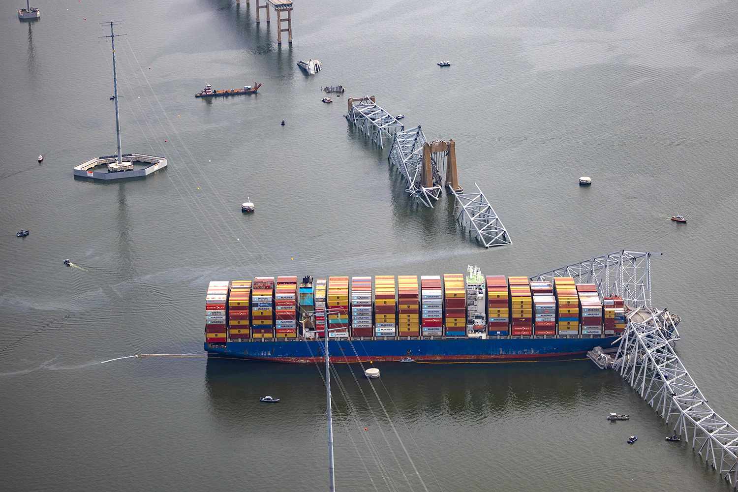 The cargo ship Dali sits in the water after running into and collapsing the Francis Scott Key Bridge on March 26, 2024 in Baltimore, Maryland