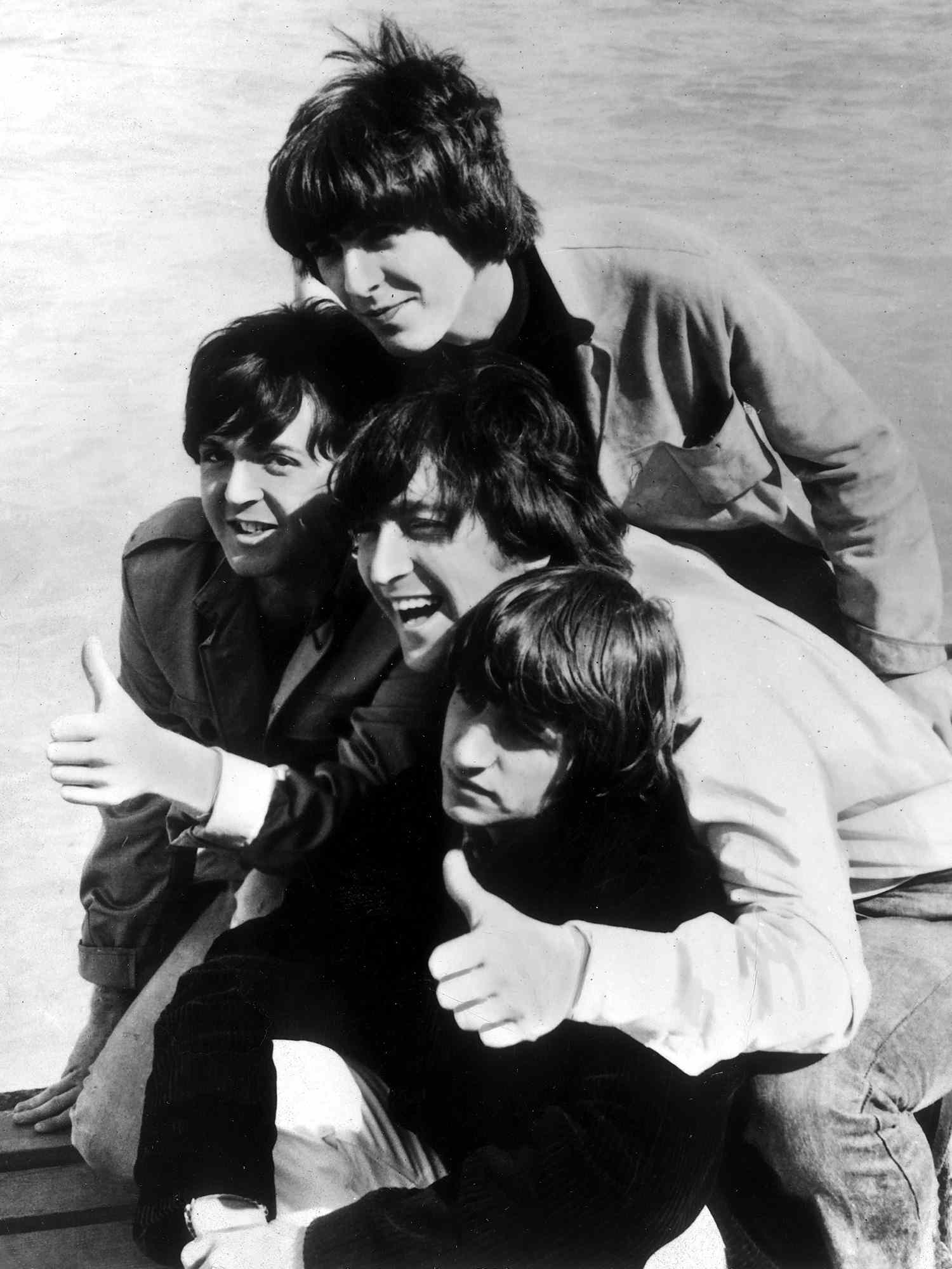 George Harrison, Paul McCartney, John Lennon, and Ringo Starr.