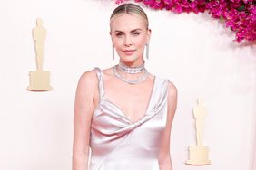 Charlize Theron arrives on the red carpet at the 96th annual Academy Awards in Los Angeles, California on Sunday, March 10, 2024. Since 1929, the Oscars have recognized excellence in cinematic achievements.