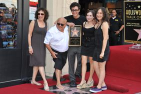 Actor Danny DeVito and family pose at the ceremony that honored him with his Star on the Hollywood Walk of Fame