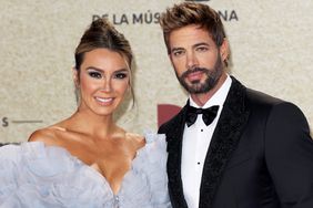 William Levy and Elizabeth Gutierrez attends the 2021 Billboard Latin Music Awards at Watsco Center on September 23, 2021.