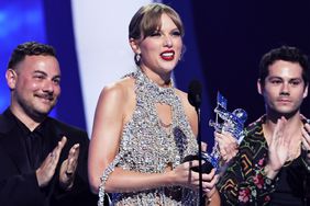 Taylor Swift accepts an award onstage at the 2022 MTV VMAs at Prudential Center on August 28, 2022 in Newark, New Jersey.