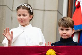 Princess Charlotte of Wales and Prince Louis of Wales on the balcony of Buckingham Palace following the Coronation of King Charles III and Queen Camilla on May 06, 2023 in London, England.