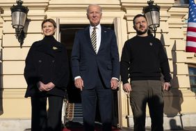 US President Joe Biden, center, meets with Ukrainian President Volodymyr Zelenskyy, right, and Olena Zelenska, left, spouse of President Zelenskyy, at Mariinsky Palace during an unannounced visit in Kyiv, Ukraine
