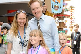 Liza Powel, Conan O'Brien and children attend Hammer Museum K.A.M.P. on May 18, 2014 in Los Angeles, California.