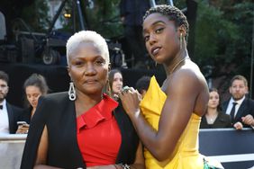 Lashana Lynch and her mother attend the World Premiere of "NO TIME TO DIE" at the Royal Albert Hall on September 28, 2021 in London, England.