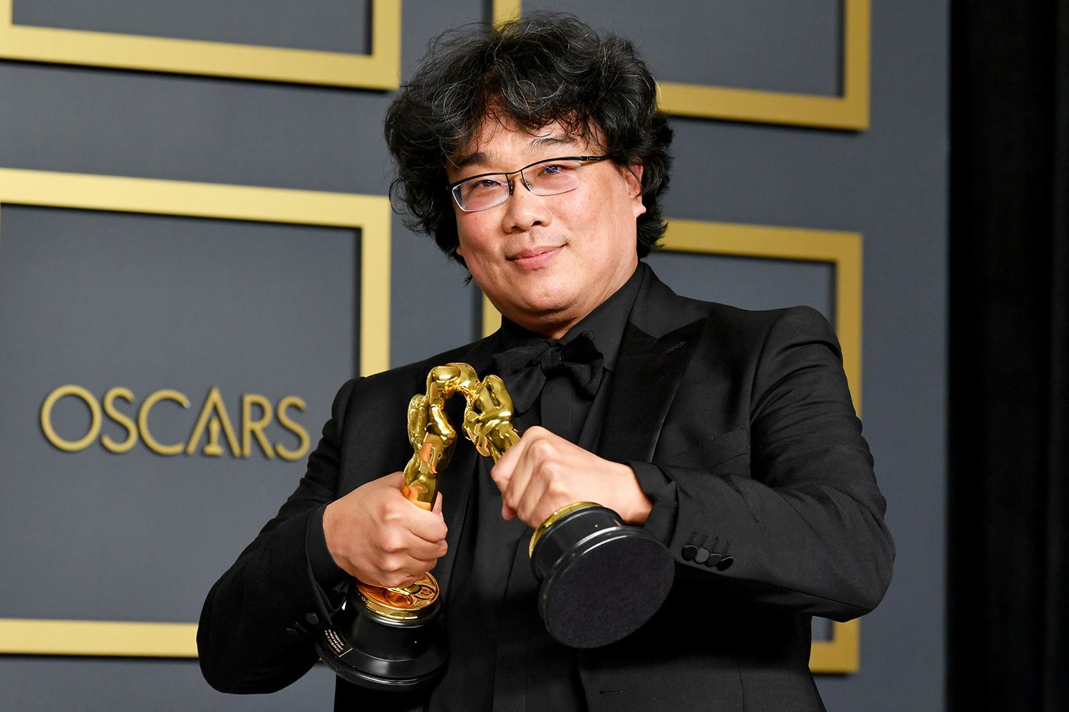 Bong Joon-ho, winner of the Original Screenplay, International Feature Film, Directing, and Best Picture awards for “Parasite,” poses in the press room during the 92nd Annual Academy Awards at Hollywood and Highland on February 09, 2020 in Hollywood, California
