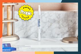 One of the best teeth whitening pens, The VieBeauti, on a bathroom counter with a People Tested badge. 