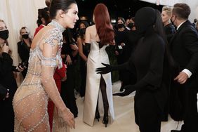 Kendall Jenner and Kim Kardashian West attend The 2021 Met Gala Celebrating In America: A Lexicon Of Fashion