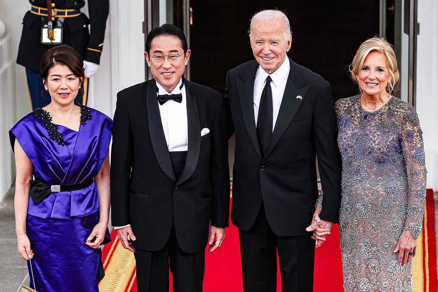 US President Joe Biden, second right, and First Lady Jill Biden, right, welcome Fumio Kishida, Japan's prime minister, second left, and his wife Yuko Kishida