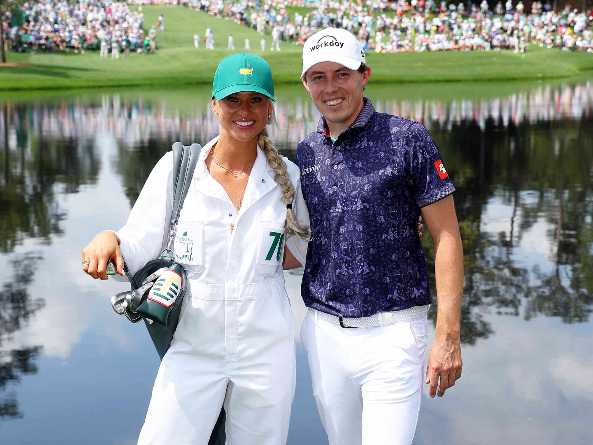 Matt Fitzpatrick of England poses with his girlfriend Katherine Gaal during the Par 3 contest prior to the 2023 Masters Tournament