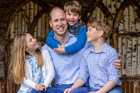 Prince William, Prince of Wales (centre) with his children Princess Charlotte, Prince Louis and Prince George (right) in Windsor, England. 