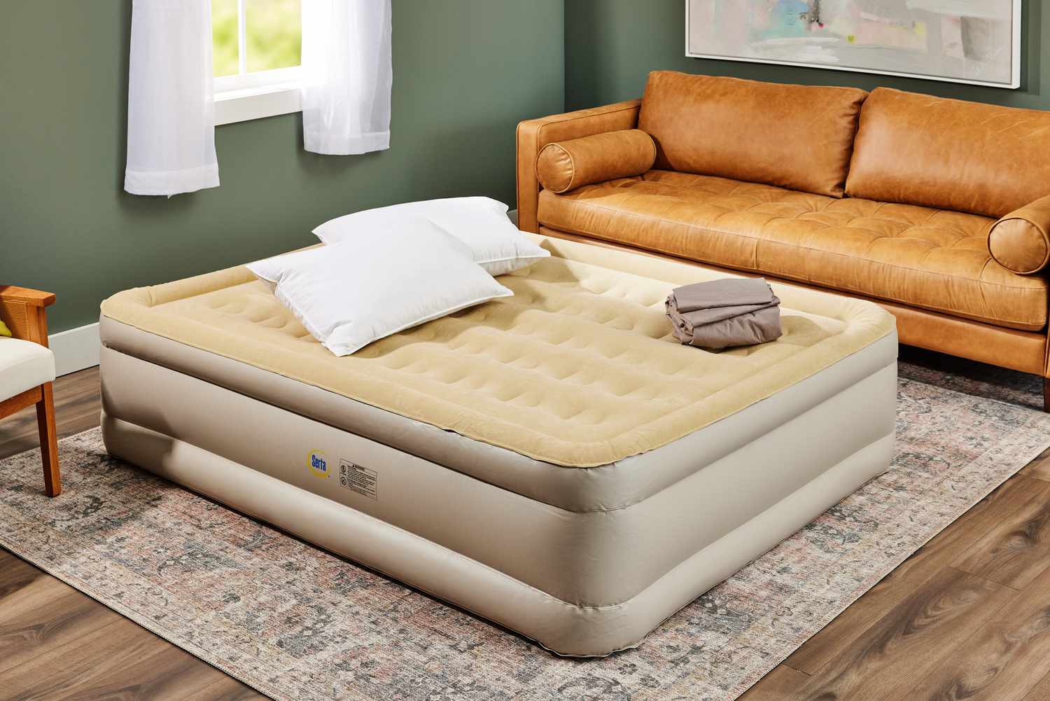 The Serta Raised Air Mattress with Never Flat Pump fully inflated