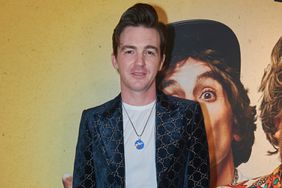  Drake Bell poses for a photo during a Red Carpet