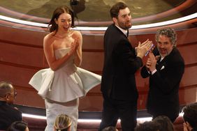 Emma Stone (L) reacts during the 96th annual Academy Awards ceremony at the Dolby Theatre in the Hollywood neighborhood of Los Angeles, California, USA, 10 March 2024. The Oscars are presented for outstandin