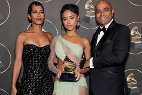  Tyla and her parents attend the 66th GRAMMY Awards at Peacock Theater on February 04, 2024 in Los Angeles, California