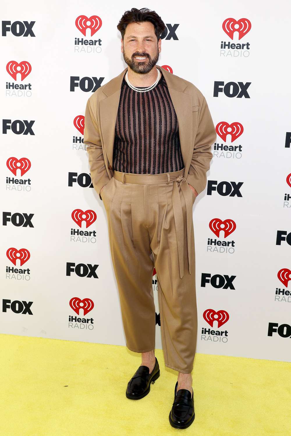 Maksim Chmerkovskiy attends the 2024 iHeartRadio Music Awards at Dolby Theatre in Los Angeles, California on April 01, 2024