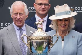 King Charles III and Queen Camilla attend Ladies Day at Epsom Downs Racecourse on May 31, 2024