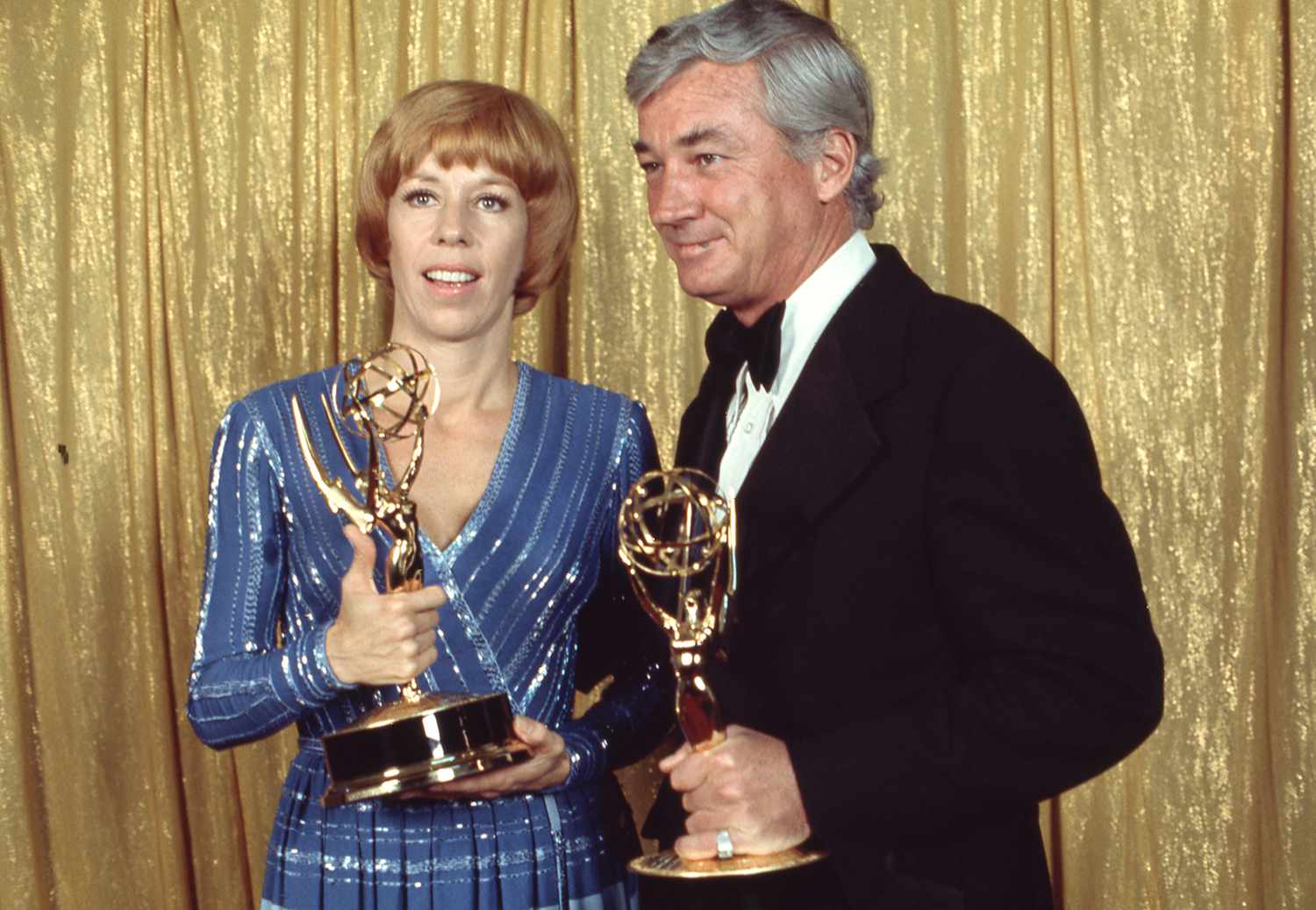 Carol Burnett and Joe Hamilton holding their Emmy Awards in the press room at The 24th Primetime Emmy Awards