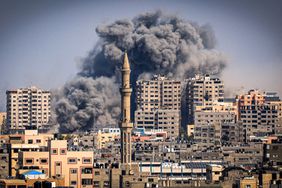 Smoke plumes billow during Israeli air strikes in Gaza City on October 12, 2023 as raging battles between Israel and the Hamas movement continue for the sixth consecutive day