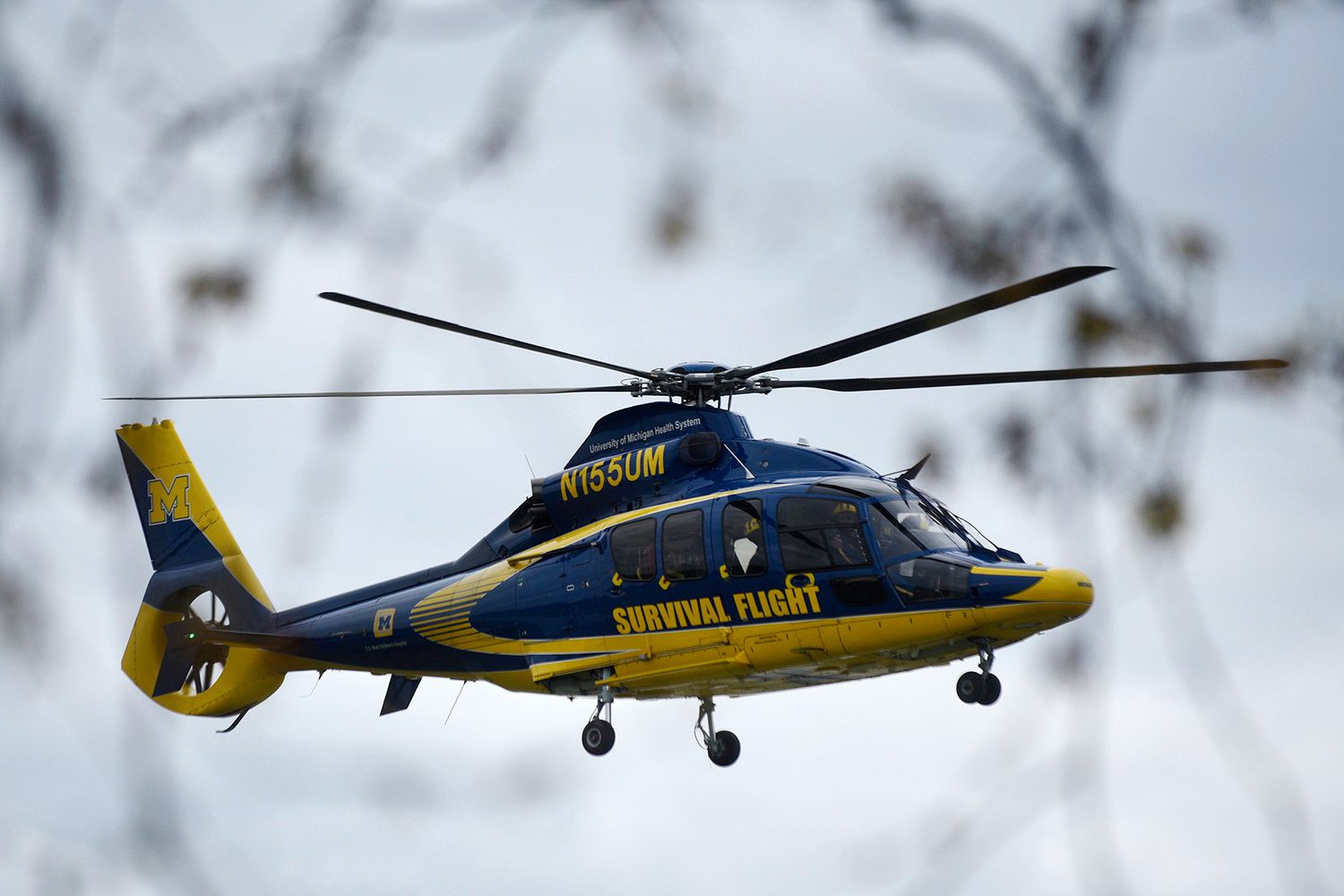 A University of Michigan Health Systems Survival Flight responds to the Swan Creek Boat Club after a driver crashed a vehicle through a building where a children's birthday party was taking place, Saturday, April 20, 2024, in Berlin Township, Mich.