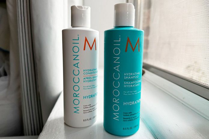 Bottles of Moroccanoil Hydrating Shampoo and Conditioner