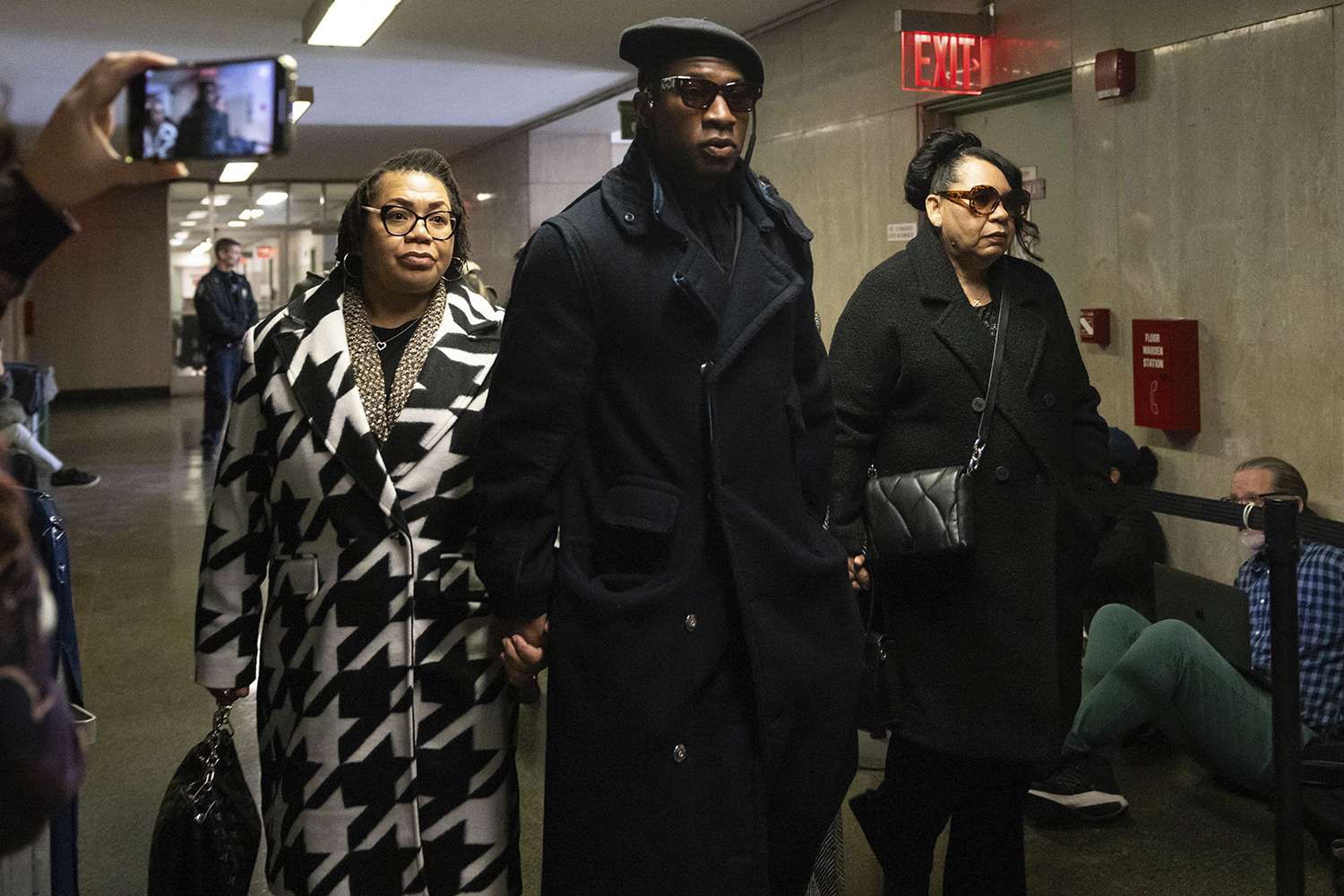 Jonathan Majors, center, arrives at court for a trial on his domestic violence case, Monday, Dec. 4, 2023, in New York