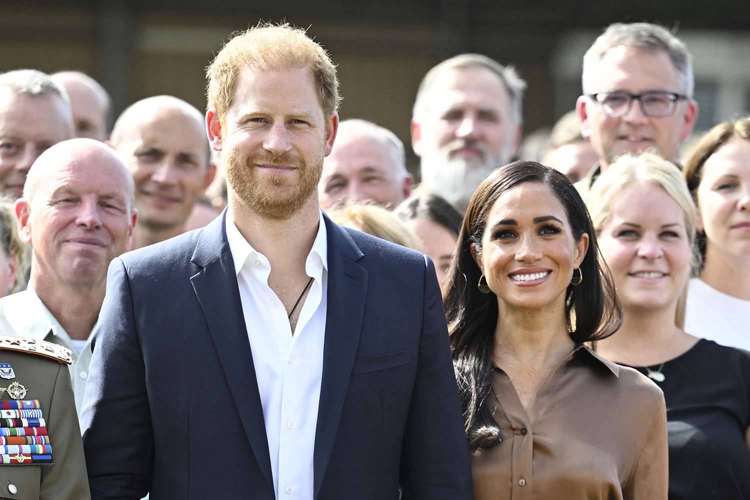 Prince Harry, Duke of Sussex and Meghan, Duchess of Sussex meet with NATO Joint Force Command and families from Italy and Netherlands during day five of the Invictus Games 
