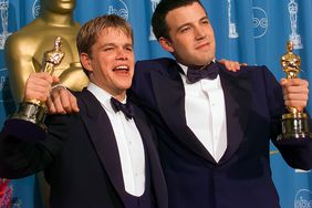 Ben Affleck and Matt Damon hold their Oscar Awards backstage at Academy Awards Show, March 23, 1998 in Los Angeles, California