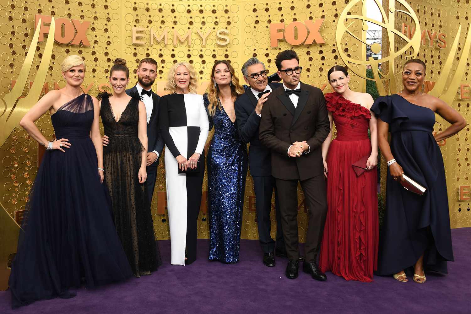 "Schitt's Creek" cast members arrive for the 71st Emmy Awards