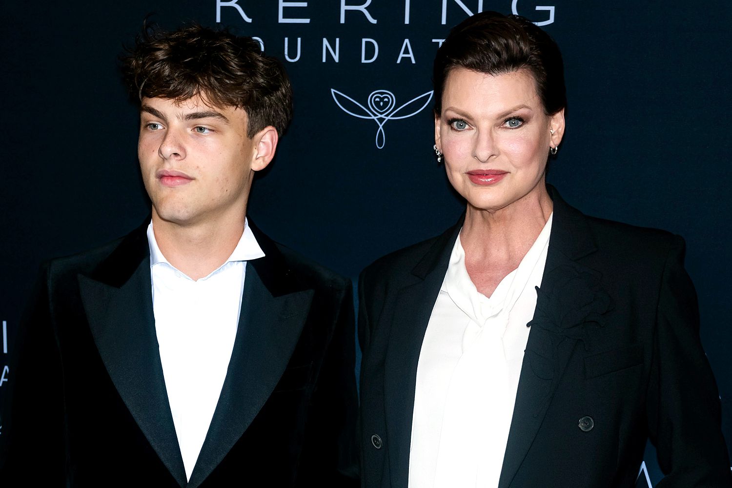 Augustin James Evangelista (L) and Linda Evangelista attend the Kering Caring for Women Dinner at The Pool on September 12, 2023 in New York City. 