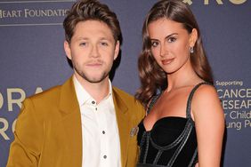 Niall Horan and Mia Woolley attend the Horan & Rose Show: Modest! Golf co-founder Niall Horan and Justin Rose brought the world of music and sport together at The Grove, presenting an evening of entertainment to raise money for The Black Heart Foundation on September 03, 2021 in Watford, England