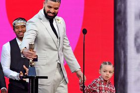 Drake, winner of the Artist of the Decade Award, and Adonis Graham speak onstage for the 2021 Billboard Music Awards, broadcast on May 23, 2021 at Microsoft Theater in Los Angeles, California