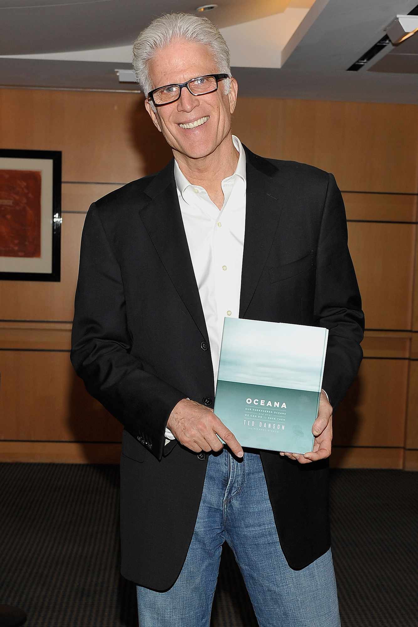 Actor/environmentalist Ted Danson signs copies of his new book "Oceana" at the Skirball Center on March 18, 2011 in Los Angeles, California.