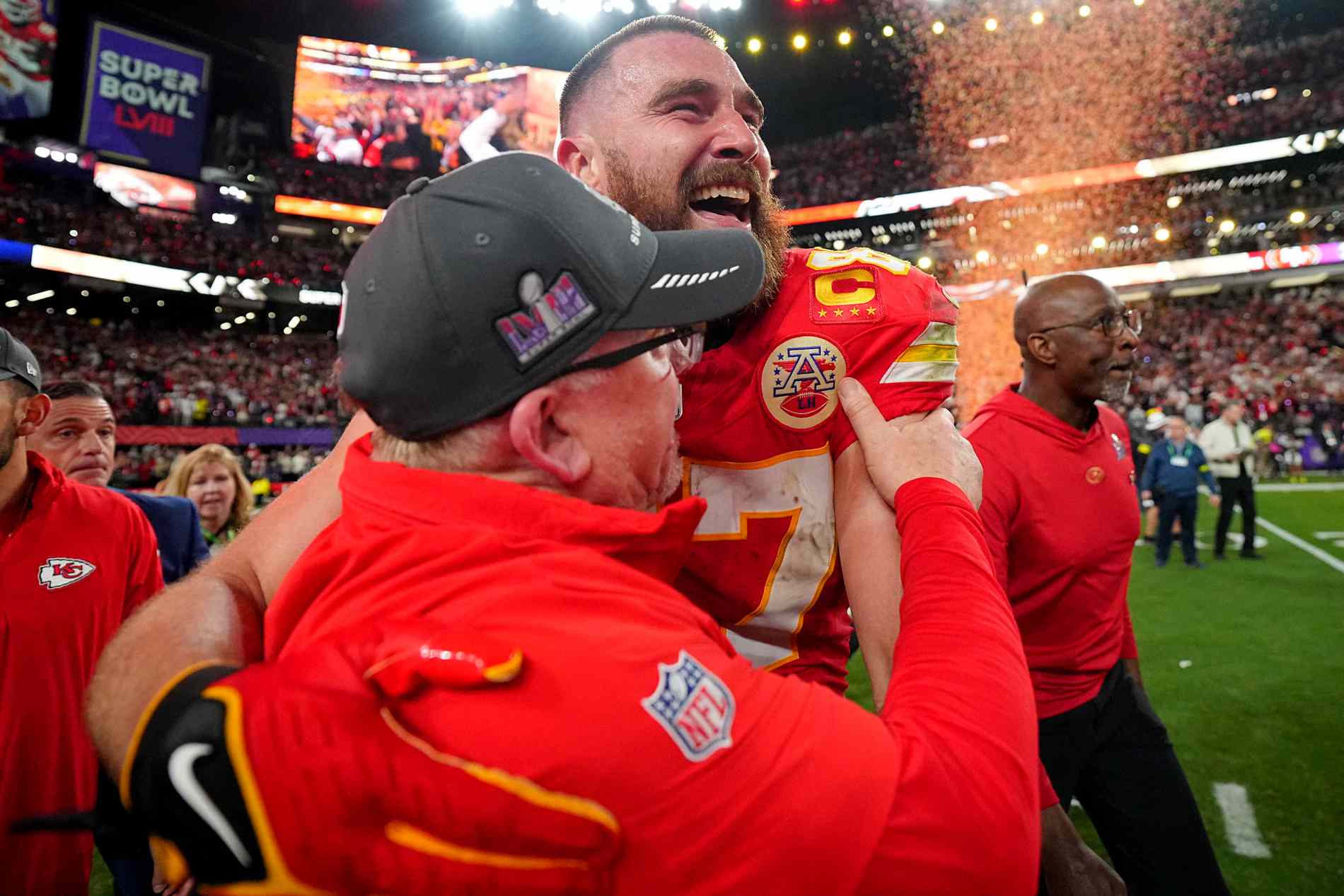 Super Bowl LVIII: Kansas City Chiefs head coach Andy Reid and Travis Kelce (87) in action, celebrate victory vs San Francisco 49ers at Allegiant Stadium. 