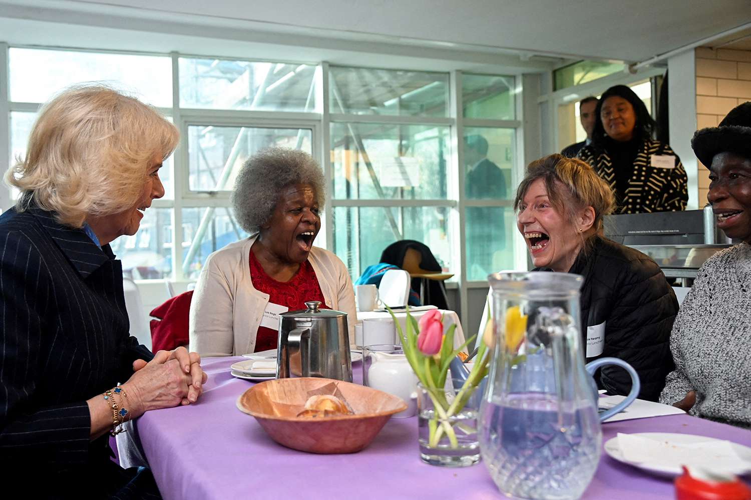 Camilla, Queen Consort (L) visits the S.T.O.R.M Family Centre, in London