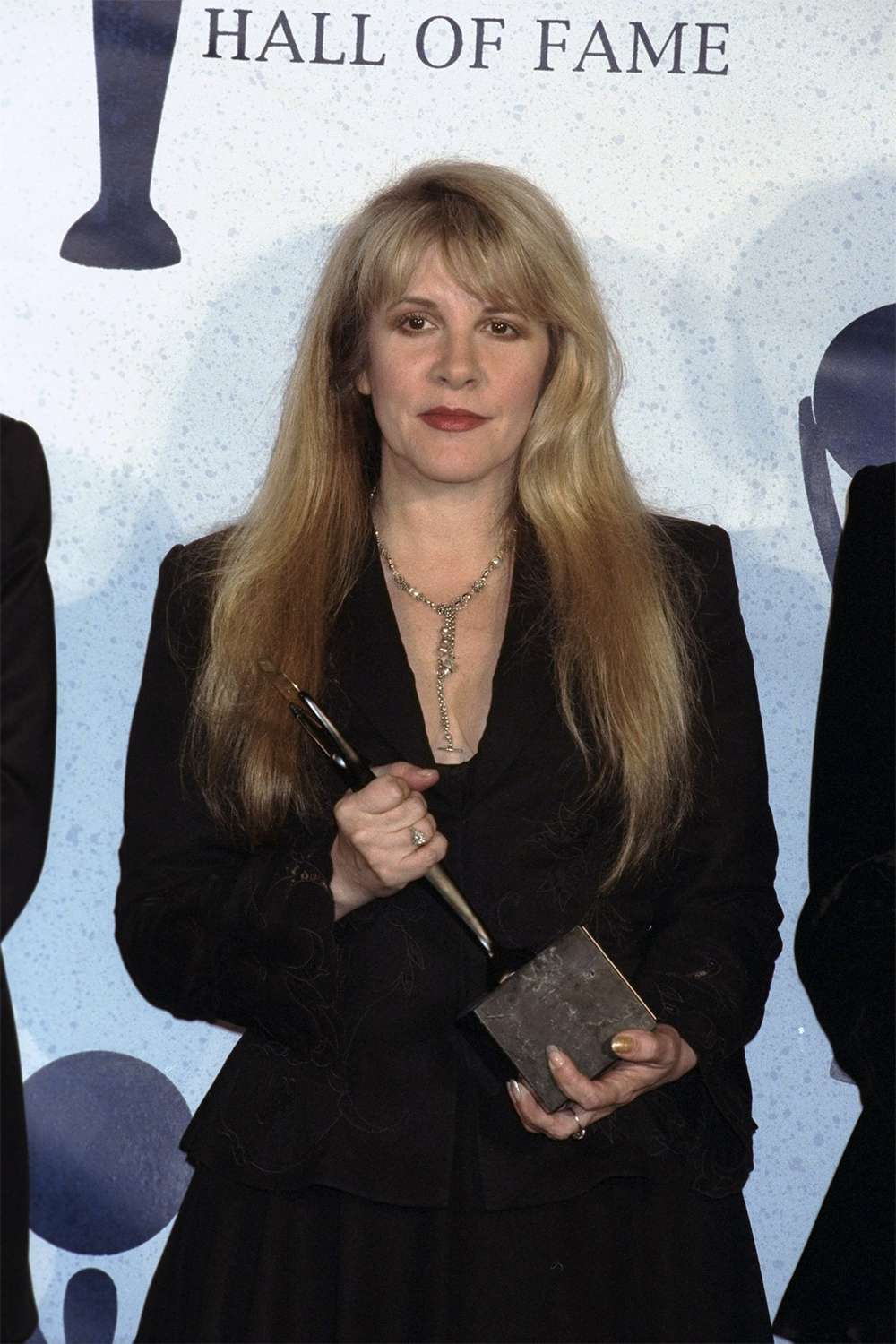 Stevie Nicks of Fleetwood Mac holds her award during Rock n' Roll Hall of Fame ceremony at the Waldorf-Astoria.