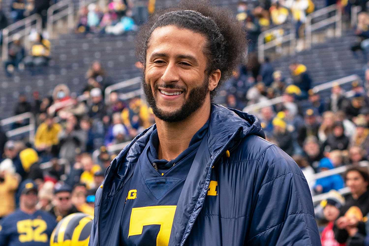 Colin Kaepernick waits to walk onto the field for the coin toss prior to the Michigan spring football game at Michigan Stadium on April 2, 2022 in Ann Arbor, Michigan. Kaepernick was honorary captain for the game.