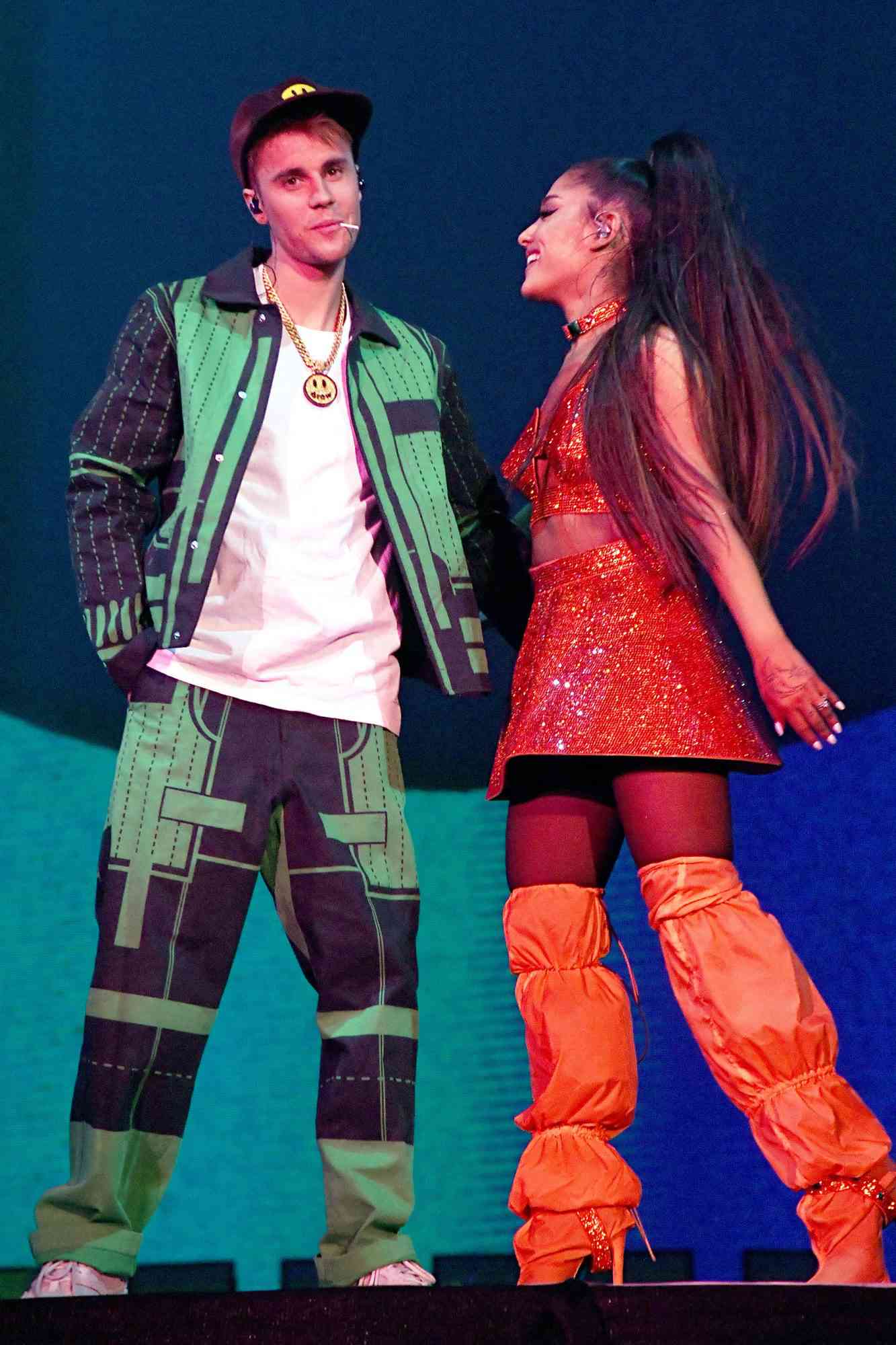 Justin Bieber (L) performs with Ariana Grande at Coachella