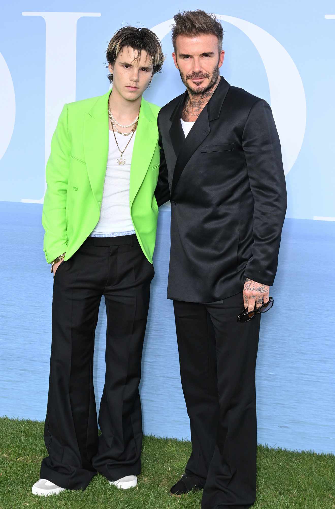 David Beckham (R) and son Cruz Beckham (L) attend the Dior Homme Menswear Spring Summer 2023 show as part of Paris Fashion Week on June 24, 2022 in Paris, France