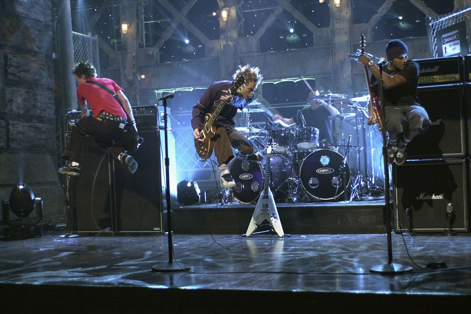 SATURDAY NIGHT LIVE -- Episode 2 -- Air Date 10/06/2001 -- Pictured: (l-r) Cone McCaslin, Deryck Whibley, Steve Jocz, Dave Baksh of musical guest Sum 41 performs the song "Fat Lip" on October 6, 2001
