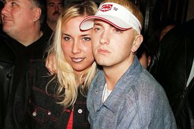 Eminem (R) and wife Kim (L) at his record release party