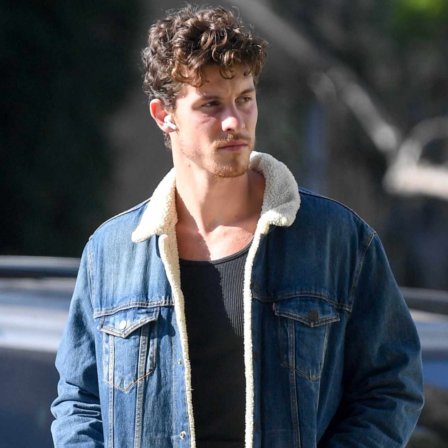 Shawn Mendes is spotted out for a stroll in Los Angeles. The Canadian singer wore a shearling lined denim jacket, black t-shirt, linen trousers, and Ugg slippers.