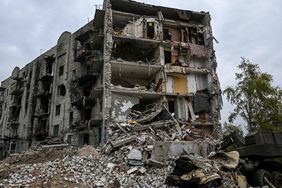 This photograph taken on September 11, 2022 shows a destroyed building in the city of Izium, Kramatorsk, eastern Ukraine, amid the Russian invasion of Ukraine. - Ukraine said on Sptember 11, 2022, that its forces were pushing back Russia's military from strategic holdouts in the east of the country after Moscow announced a retreat from Kyiv's sweeping counter-offensive. (Photo by Juan BARRETO / AFP) (Photo by JUAN BARRETO/AFP via Getty Images)
