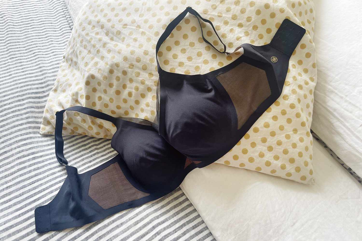 Honeylove Crossover Bra displayed on a pillow