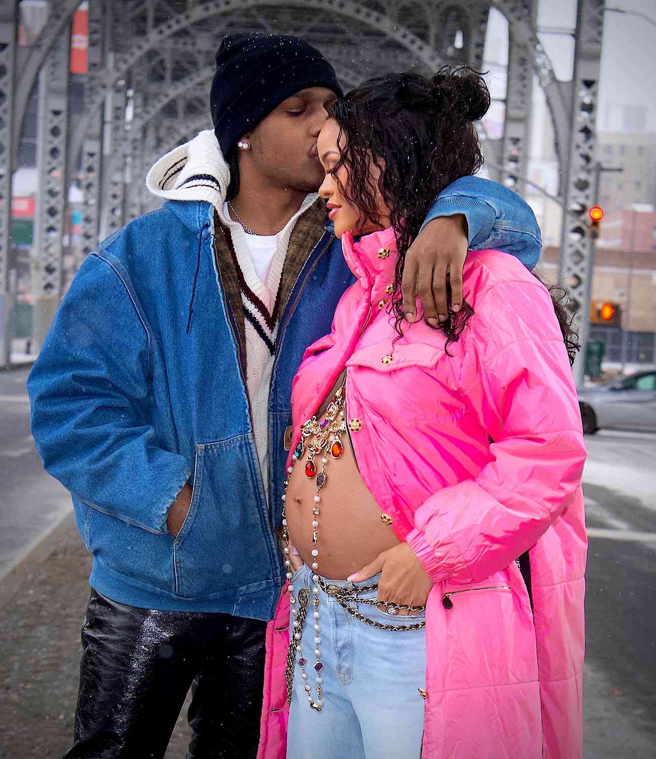 1.28.22, friday--Rihanna is set to be a Mom for the very first time ! She was spotted out in NYC with Boyfriend, ASAP Rocky this weekend, shocking the world with her baby bump on full display. The inseparable pair stepped out in Harlem, his hometown, and were seen looking happier than ever. Rihanna’s bare bump was adorned by an elegant gold cross with colorful jewels, as she leaned into her boyfriend’s tender kiss on her forehead. She looked absolutely radiant as they enjoyed a walk in the snowy brisk air together before headed back to their new apartment together to prepare for parenthood. MANDATORY BYLINE - DIGGZY/Shutterstock